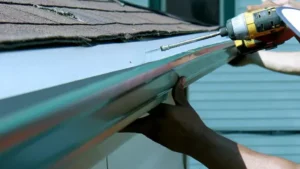 Installing gutter with drill