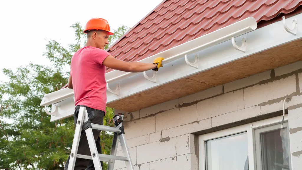 Professional Gutter Inspection On Residential House